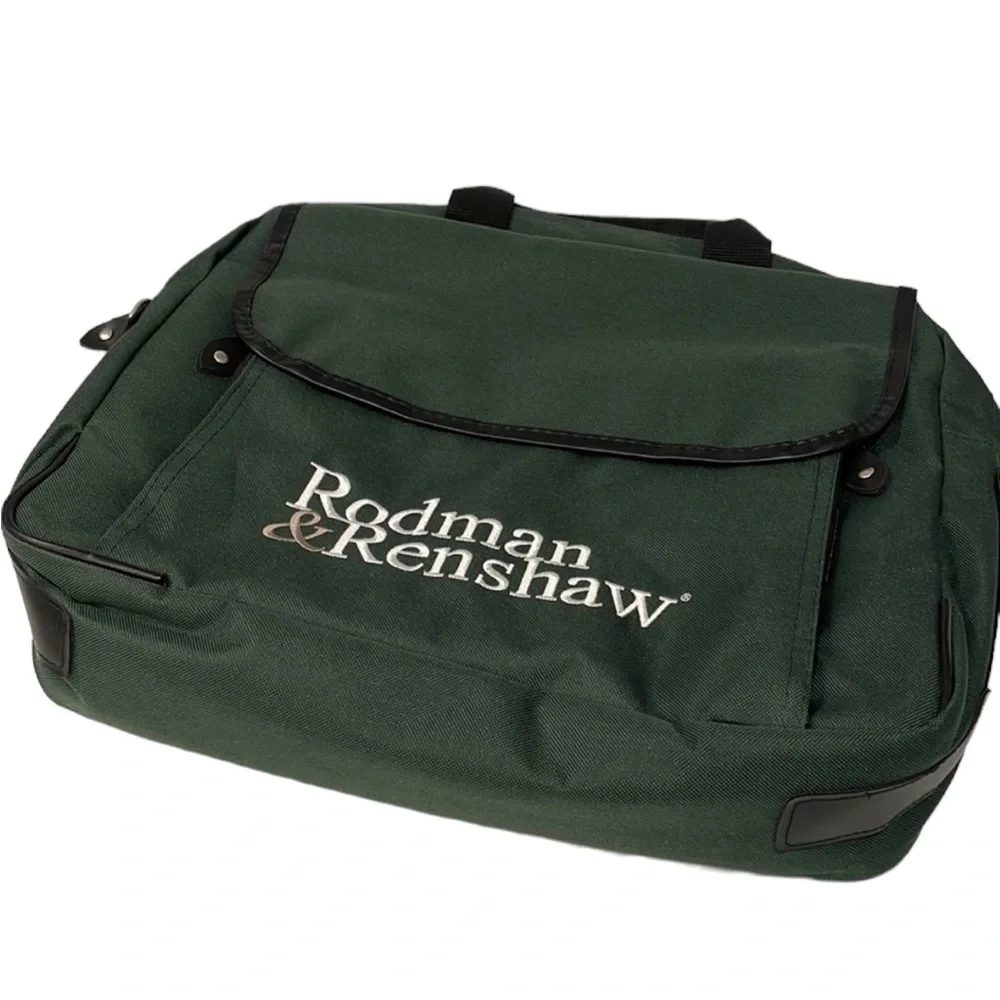 Dark green canvas briefcase with laptop sleeve and multiple pockets. NWT